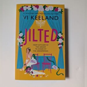 Jilted by Vi Keeland. Paperback Book With Sprayed Edges